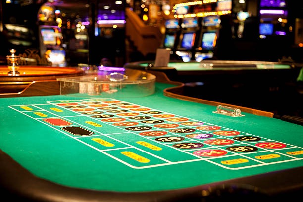 Live roulette wheel and dealer studio interface on mobile screen